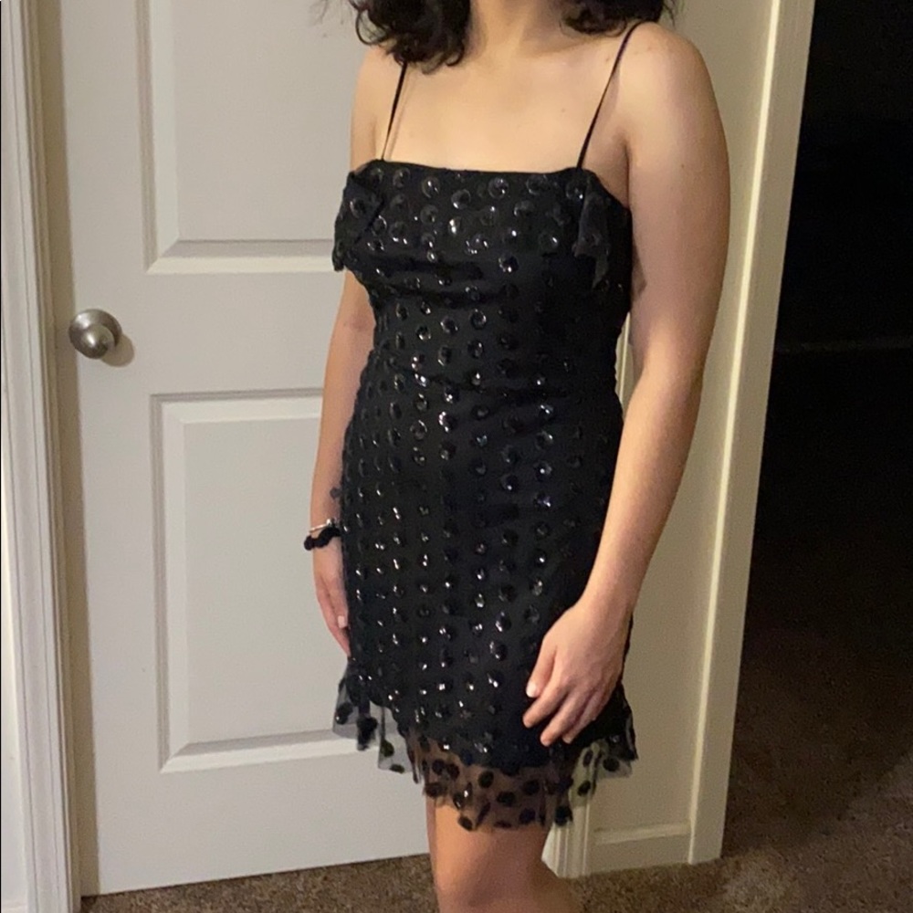 Juniors Black dress with sequins polka dots.